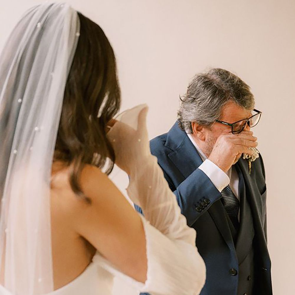 father of the bride gets emotional seeing bride