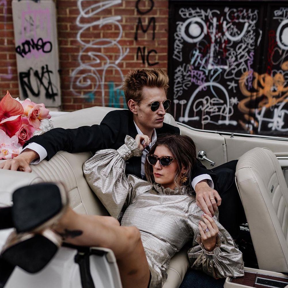 bride wearing short gold wedding dress with sunglasses