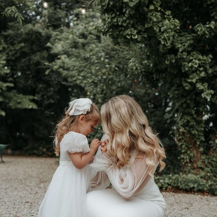 Bride With Flower Girl At Luxe Black Tie Wedding