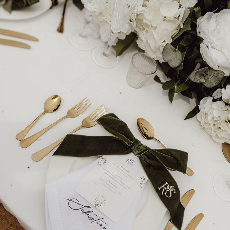 Traditional Luxe Wedding Place Setting with Green Velvet Bow & Gold Cutlery