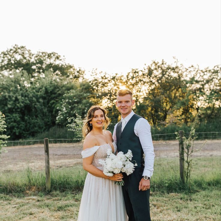 Bride in Off The Shoulder Wedding Dress with Pet Dog Wearing Bow