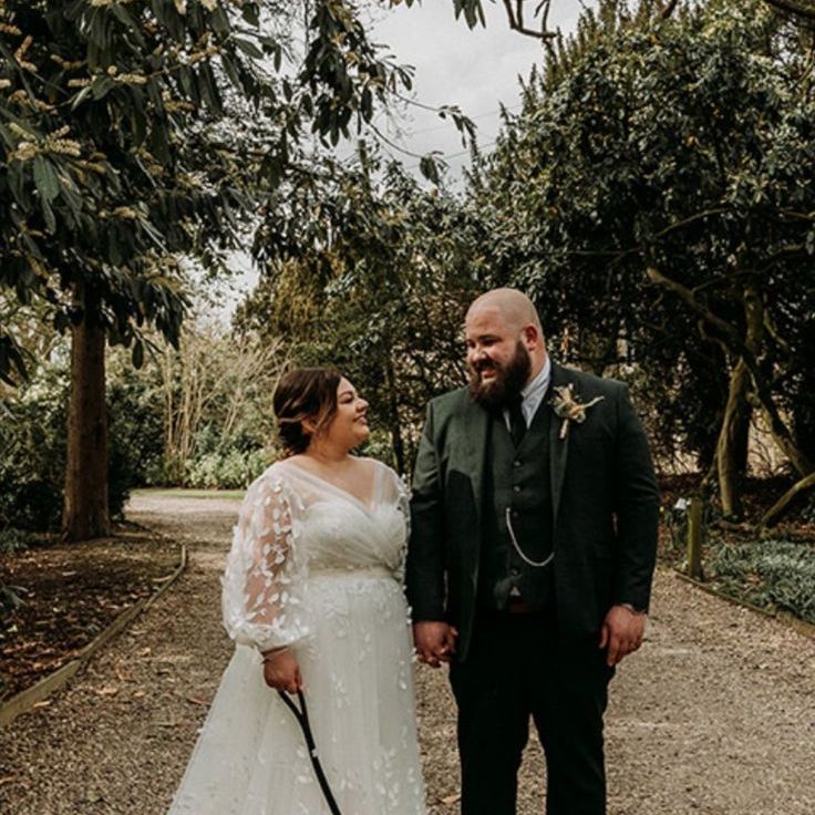 Pets At Weddings Inspiration With Bride & Groom Walking Their Pet Dog