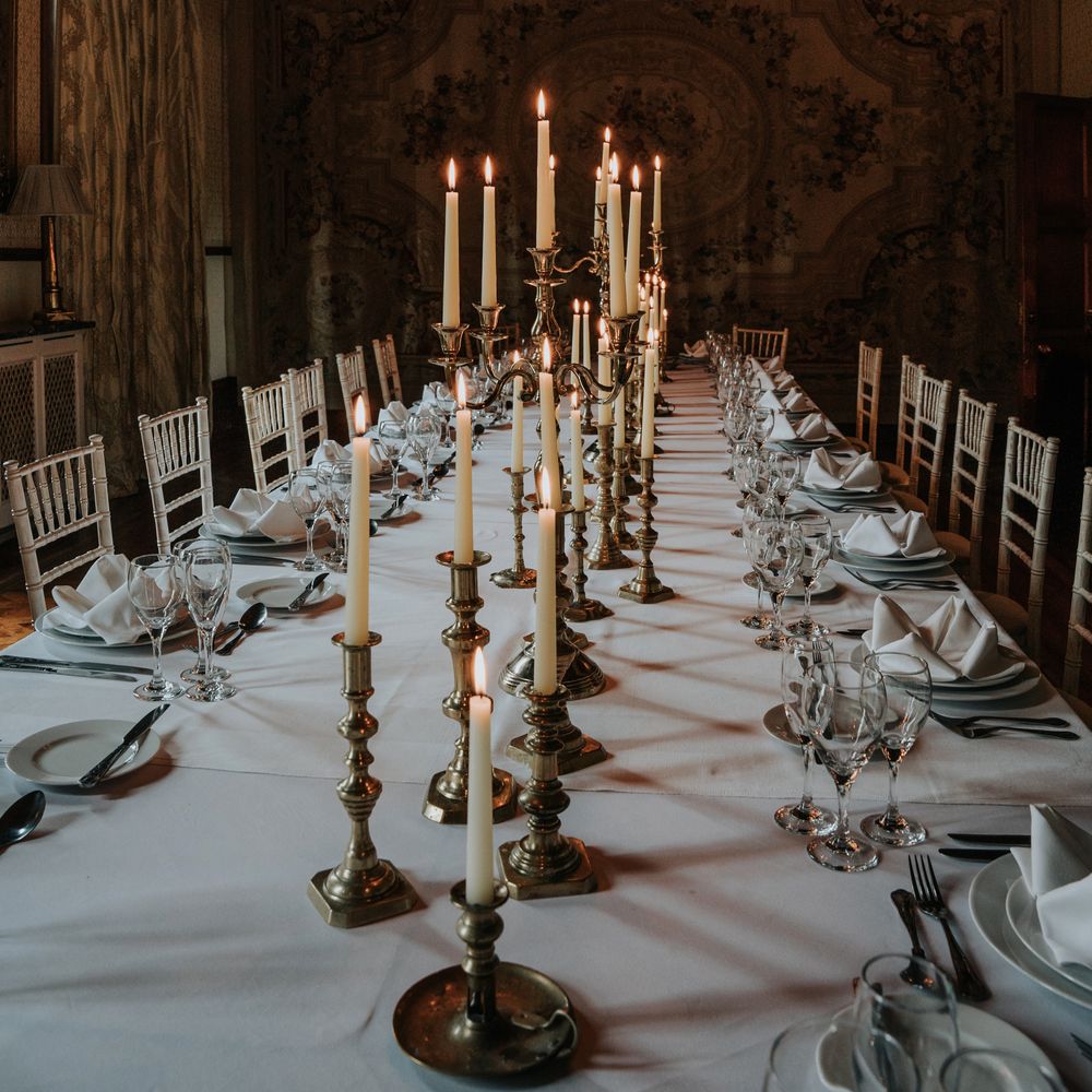 Candle lit wedding banquet table