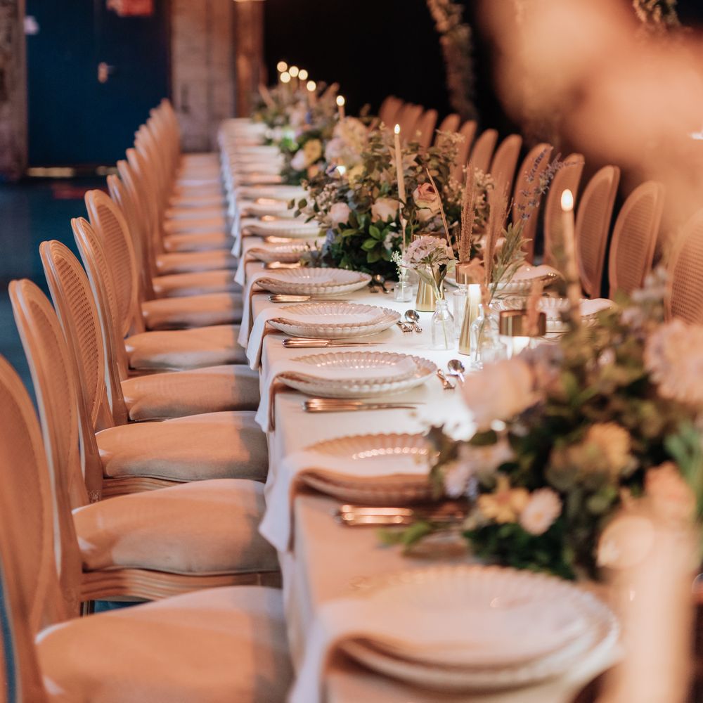 Hanging chandeliers over winter wedding table decor