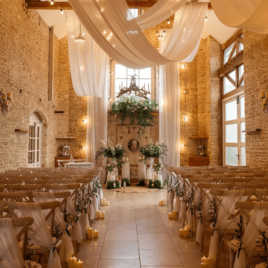 Cosy lighting and drapery for ceremony space 