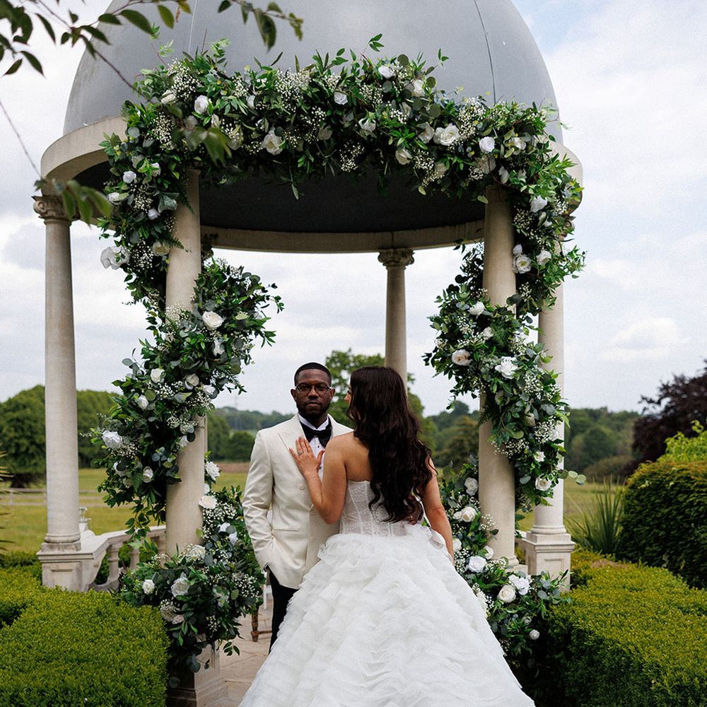 Romantic couple portrait under gazebo