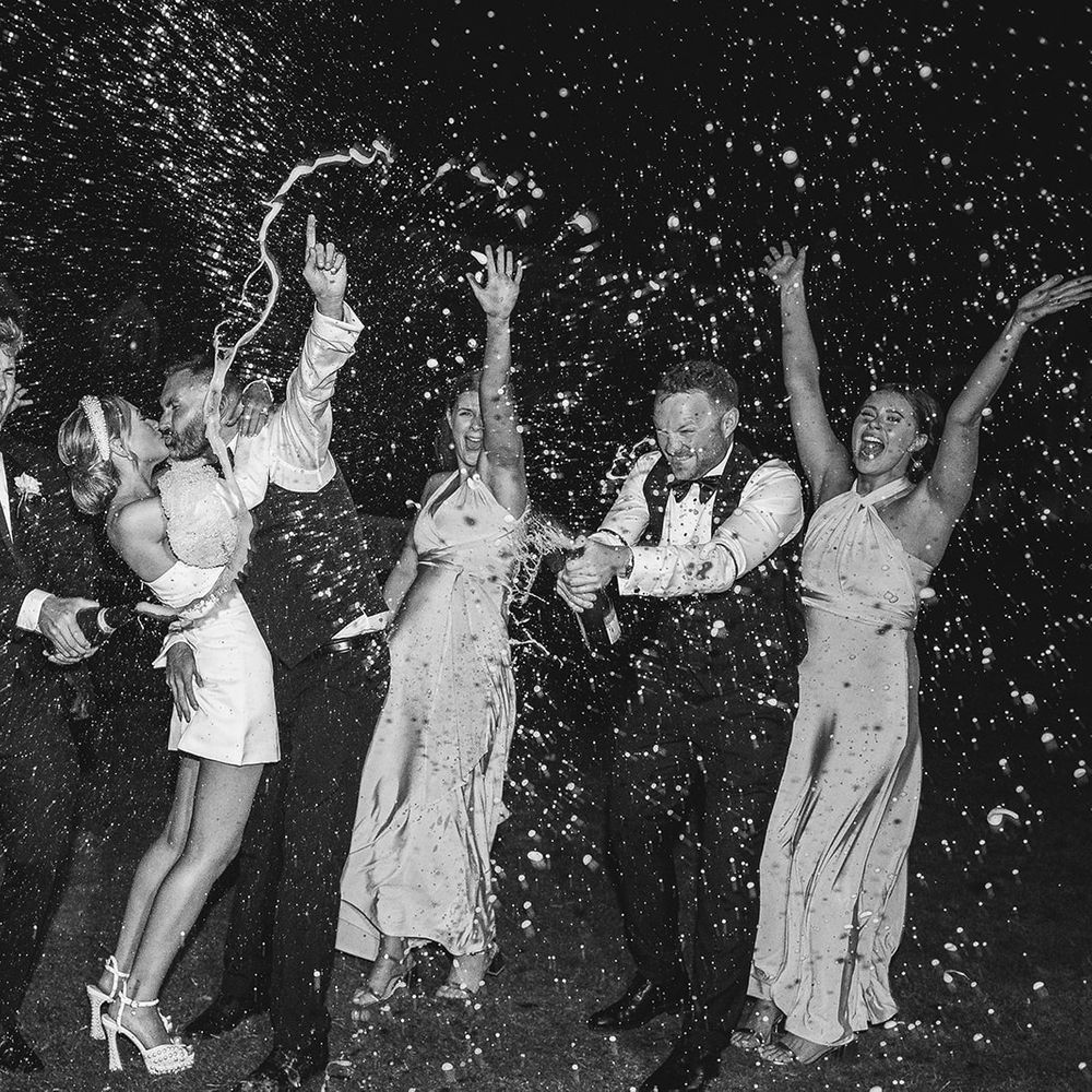 Champagne spray moment 