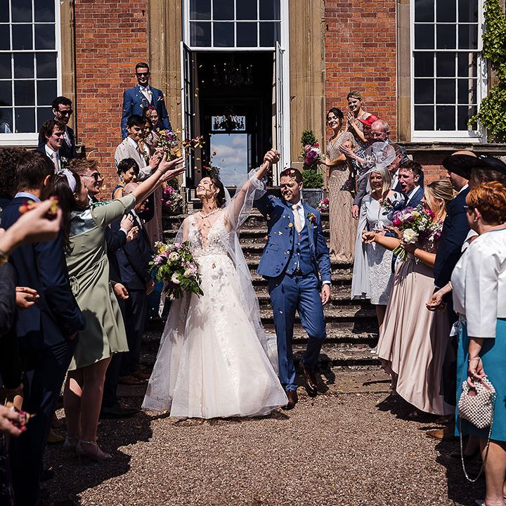 Confetti moment for couple after ceremony