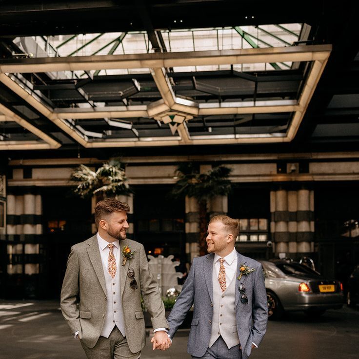 Complementary Matching Green & Blue Wedding Suits For Two Grooms