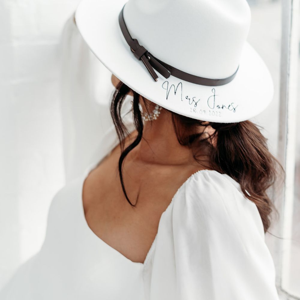 Bride wearing personalised bridal hat