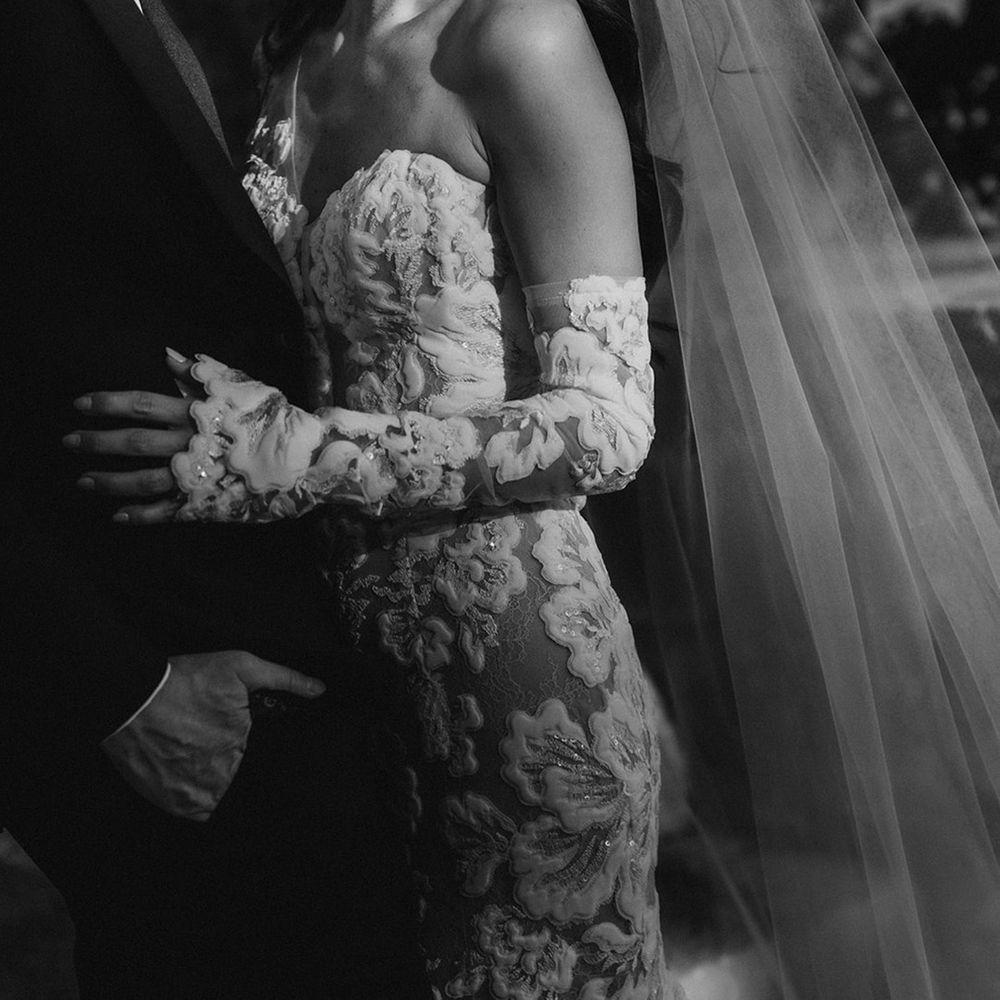 bride-wearing-strapless-wedding-dress-with-bridal-gloves