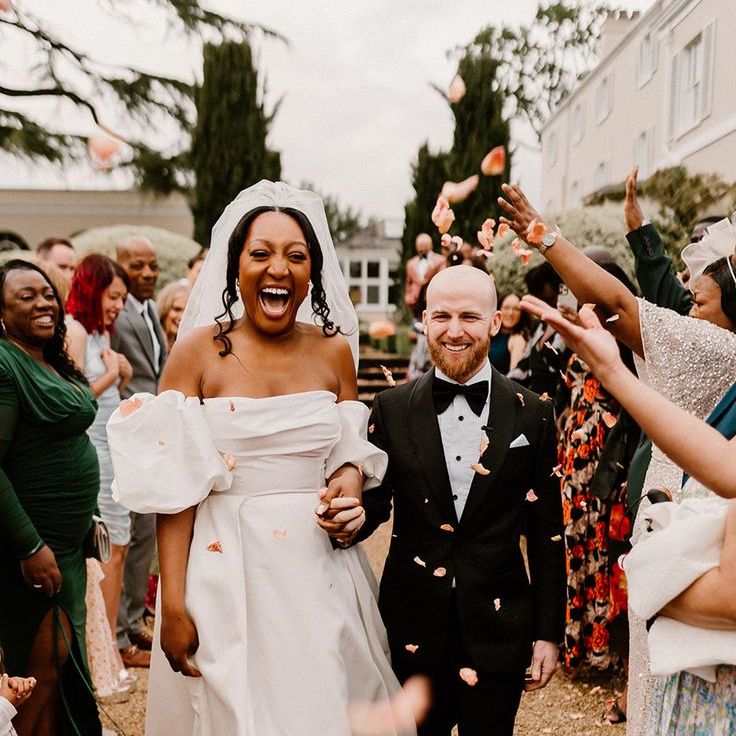 Guests Throw Confetti Over The Newlyweds