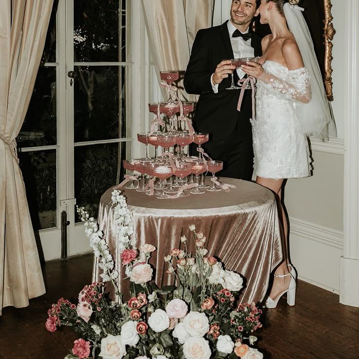 Pink Champagne Tower With Bows Wedding Drinks Idea