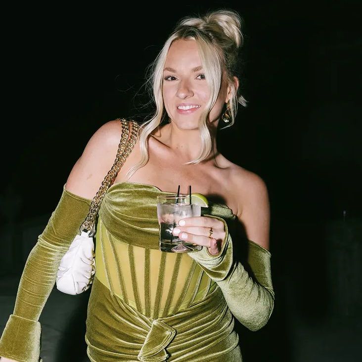 Wedding Guest In Dark Green Velvet Dress