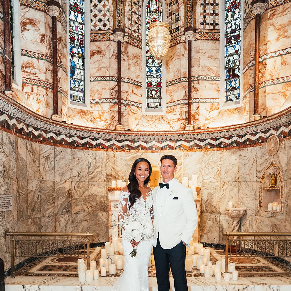 Bride and groom at luxe Fitzrovia Chapel wedding 