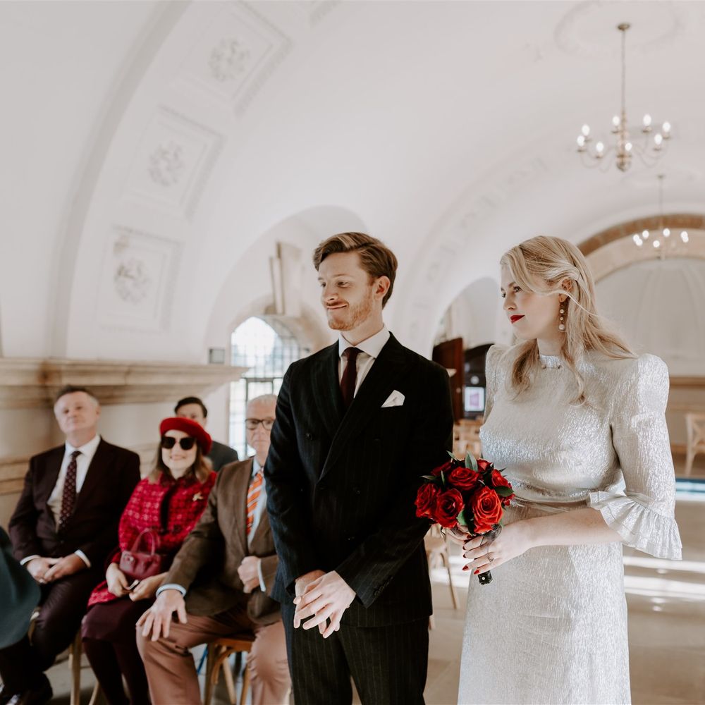 Couple exchange wedding vows at wedding ceremony