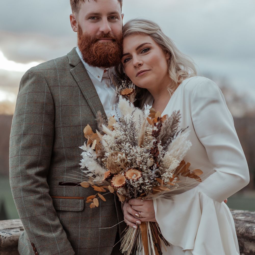 Bride and groom pose for their couple portraits