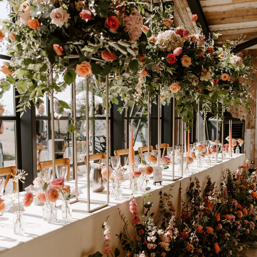 Pink wedding table flower arrangements for barn wedding