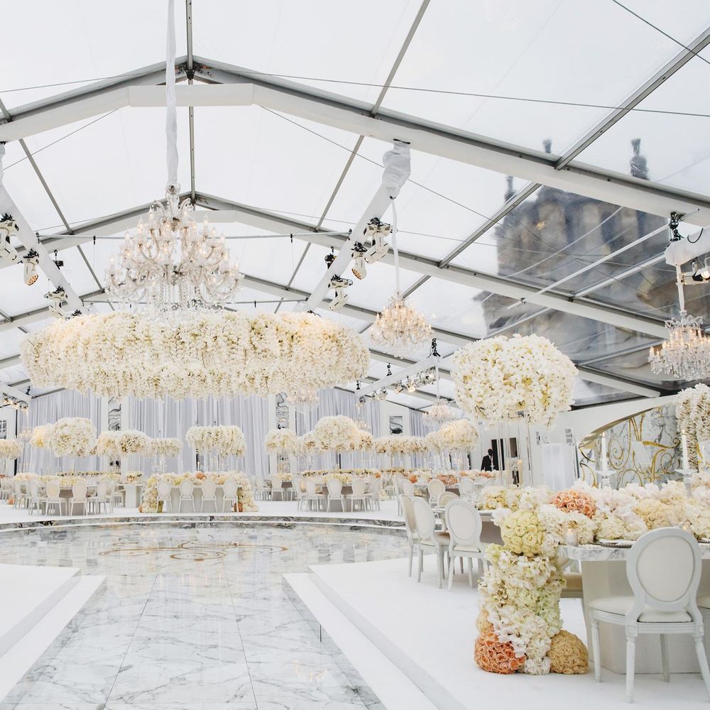 Glass marquee with white flower decor