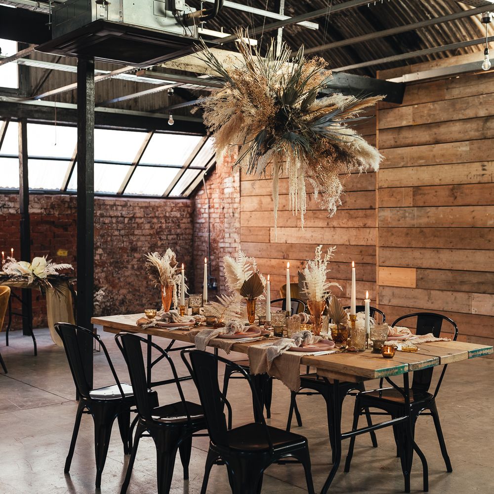 Classic rustic wedding tablescape with pampas grass wedding centrepieces and suspended pampas grass wedding decor at The Shack Revolution wedding venue