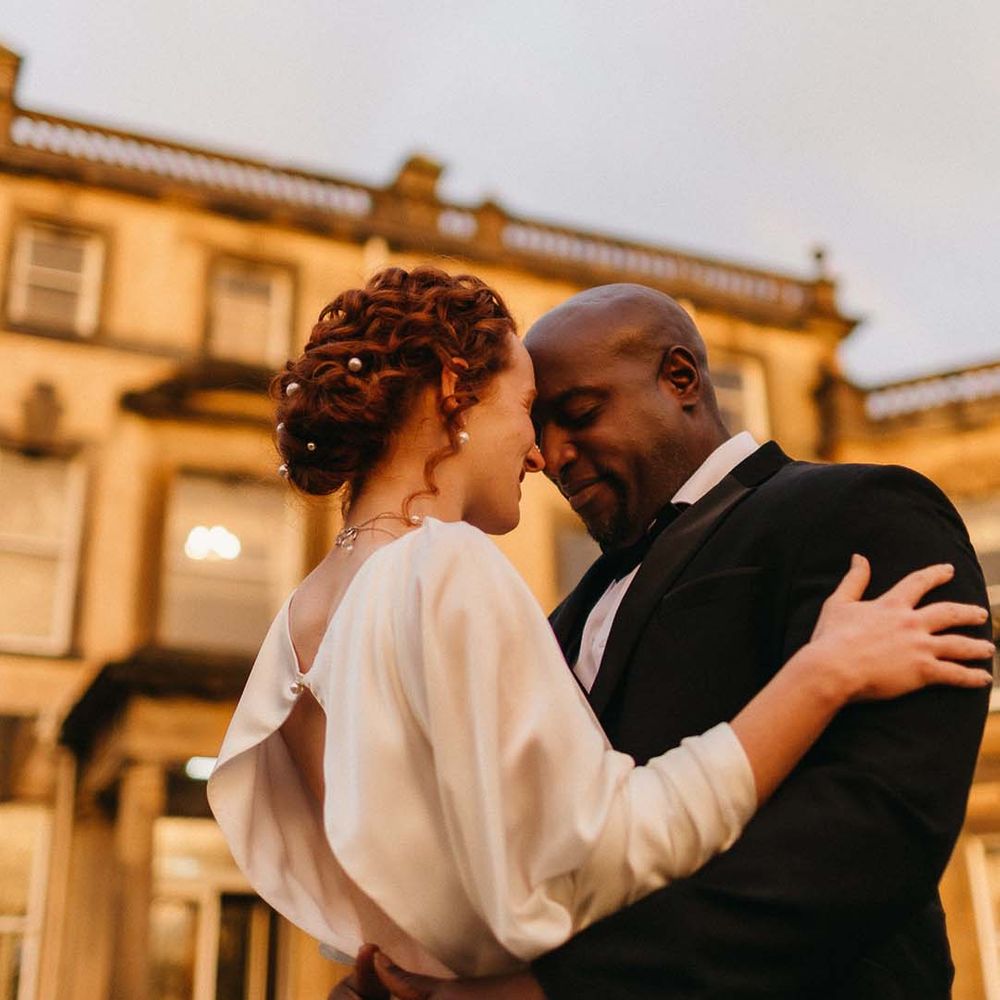 Golden hour couple photo in front of Pepper Arden Hall