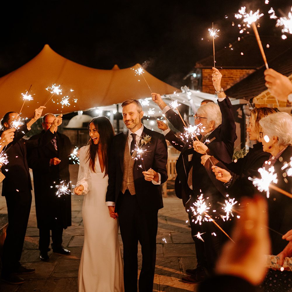 Sparkler Moment at outdoor marquee wedding in Wasing Park