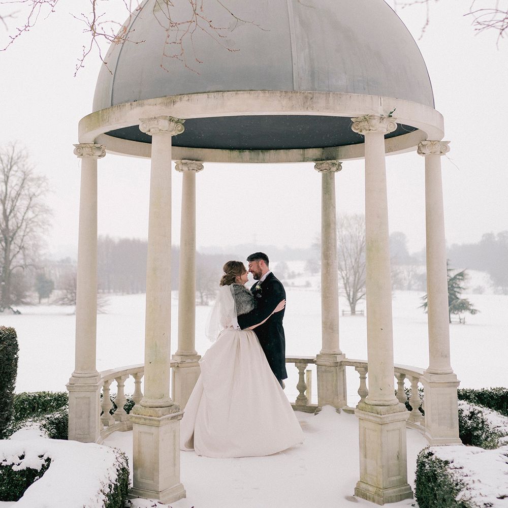 Snowy outdoor couple portrait