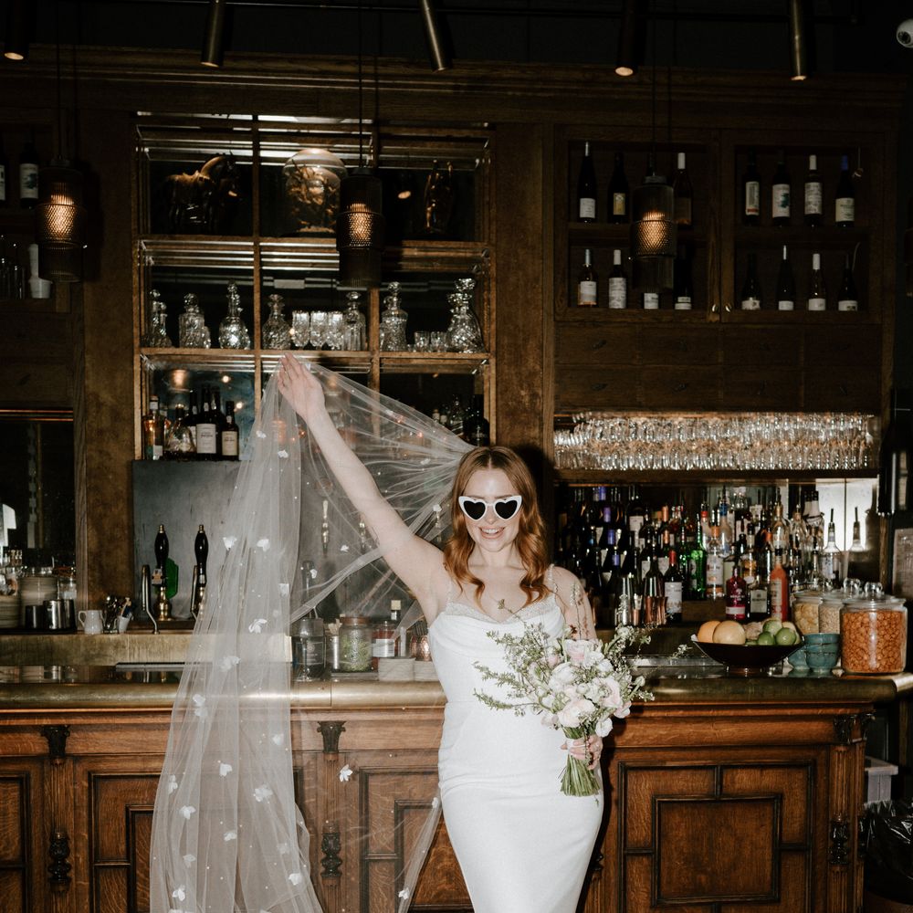 Bride at winter wedding with white bouquet