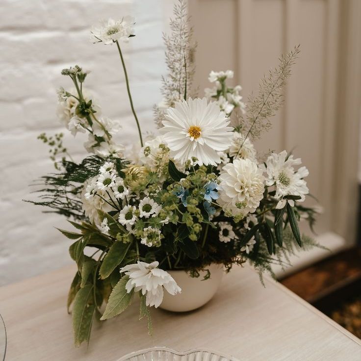 All White Wedding Flower Decorations in Bowl Arrangements