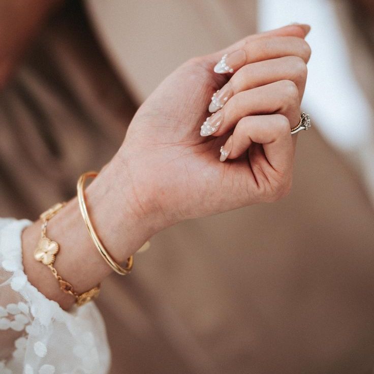Bride With White French Tip Wedding Nails with Mini Pearls