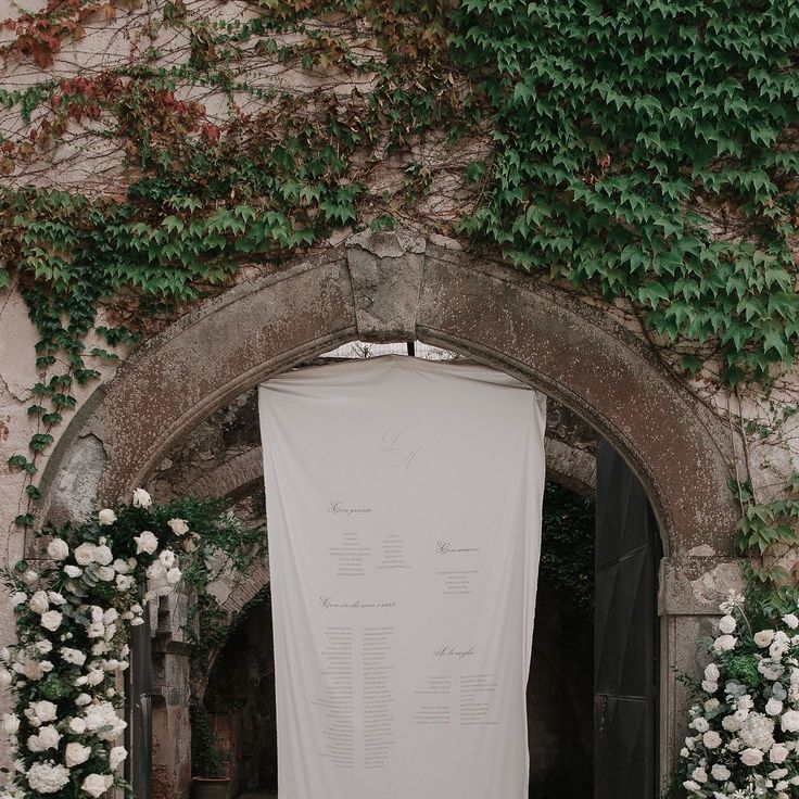White Wedding Fabric Seating Chart Signage At Timeless Destination Wedding