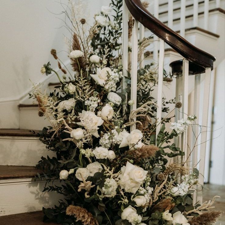 White Wedding Flowers Decorating Staircase For Traditional Wedding