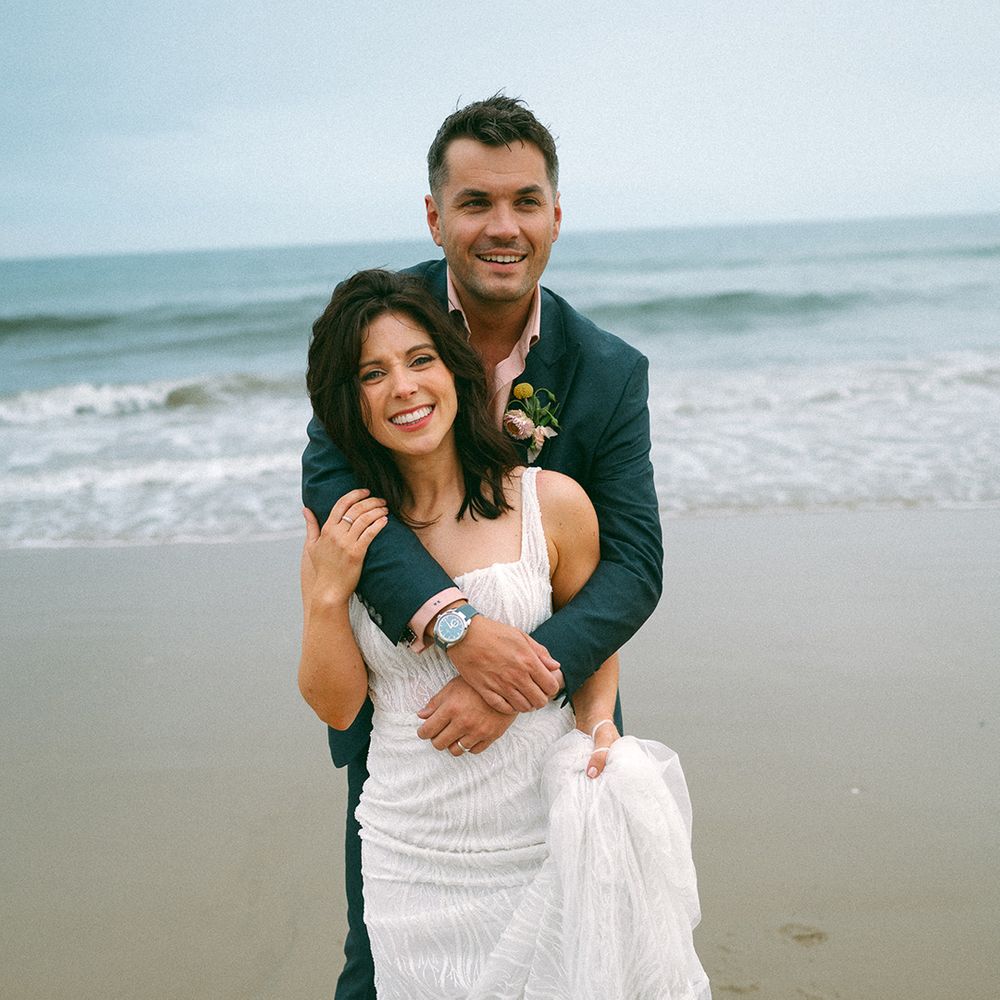 bride-and-groom-embrcae-on-beach