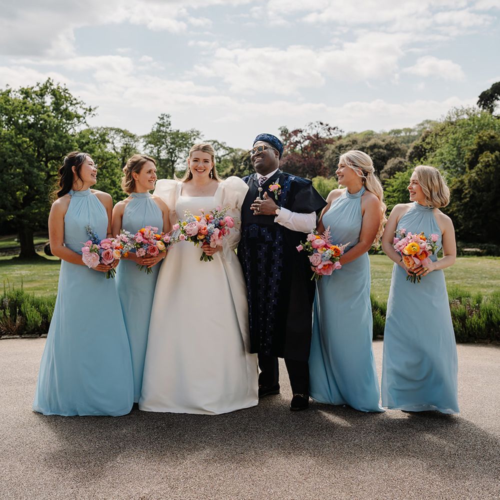 bridesmaids-wearing-blue-bridesmaid-dresses