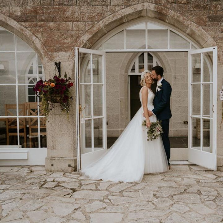 Couple in doorway at Pennsylvania Castle Estate