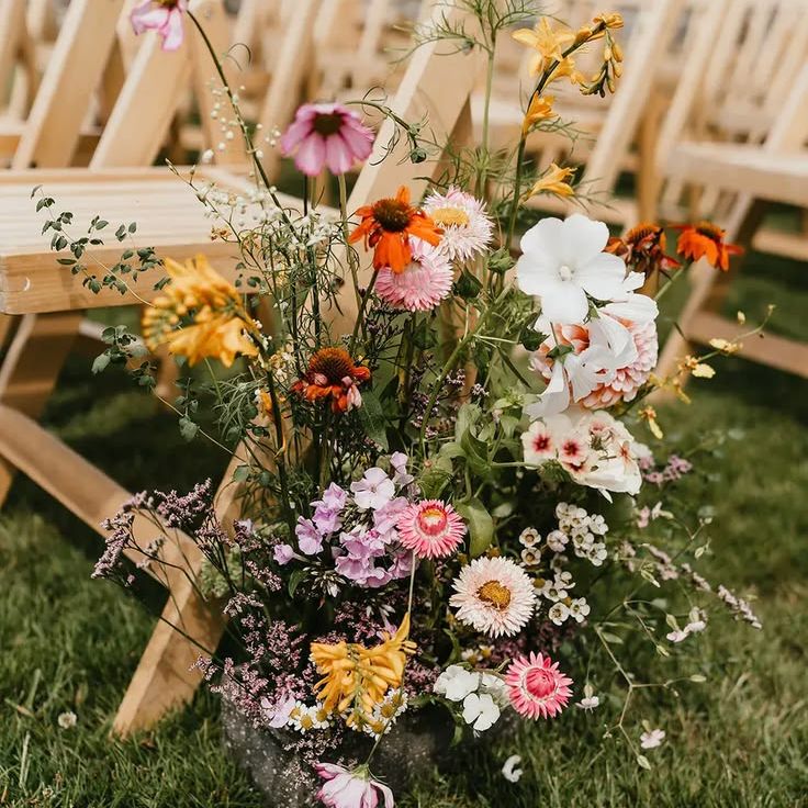 Colourful Meadow Aisle Flower Decorations
