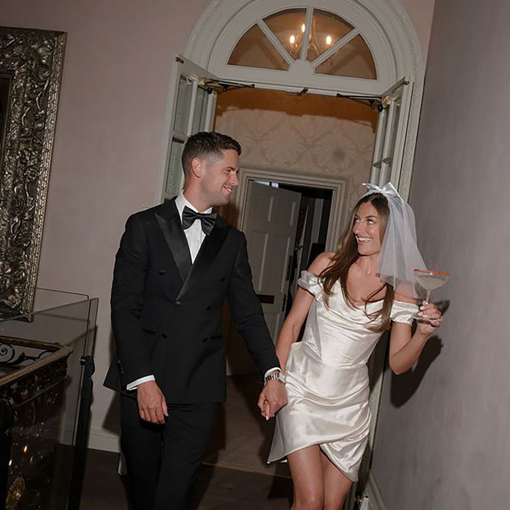 Bride in short Vivienne Westwood sustainable wedding dress