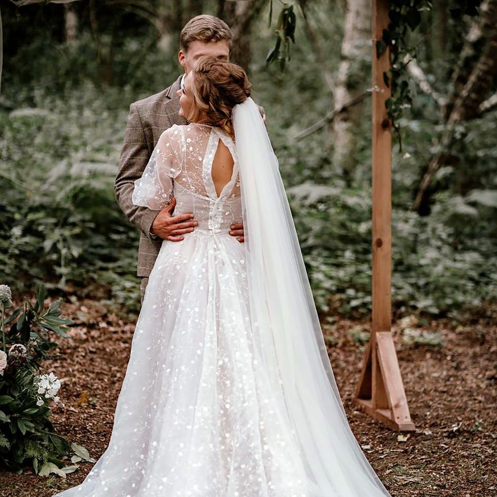 Bride in sustainable wedding dress for eco-friendly wedding