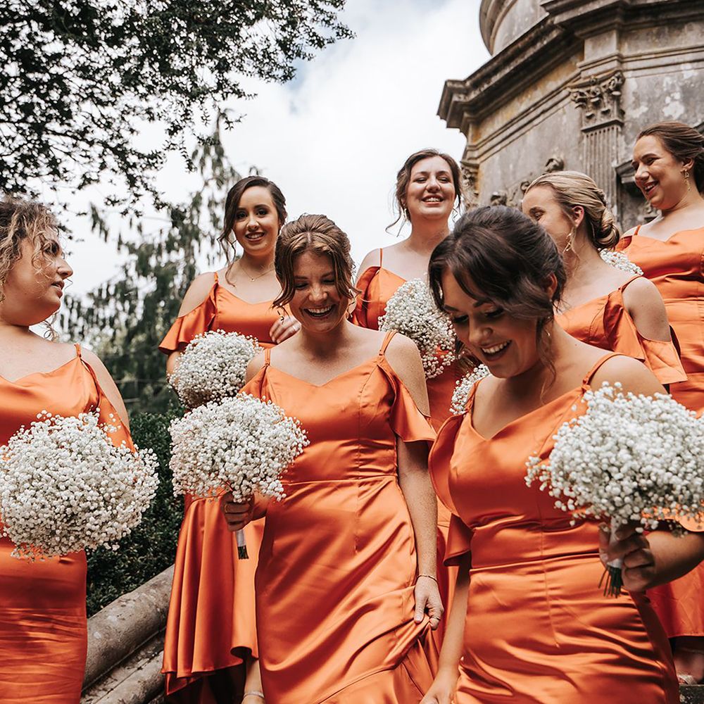 Aperol Spritz coloured orange bridesmaid dresses