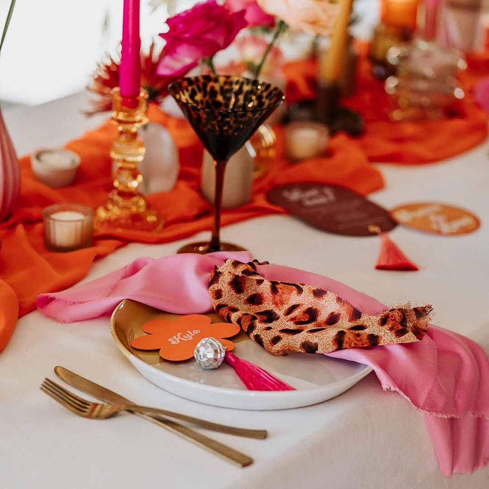 orange, pink and leopard print wedding table decor