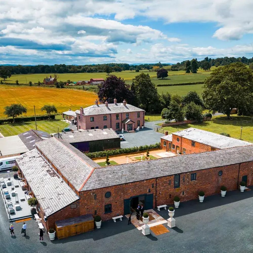 Burlton Manor aerial view best barn wedding venue