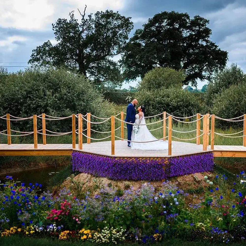 Burlton Manor the cherub fountain flower bed bridge