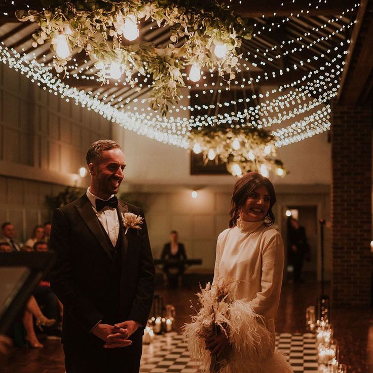 Bride in Short Wedding Dress with Groom in Black Tie At Cosy Wedding