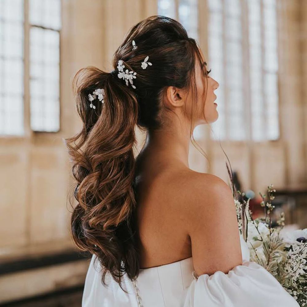 Bride With A Wavy Ponytail Wedding Hairstyle