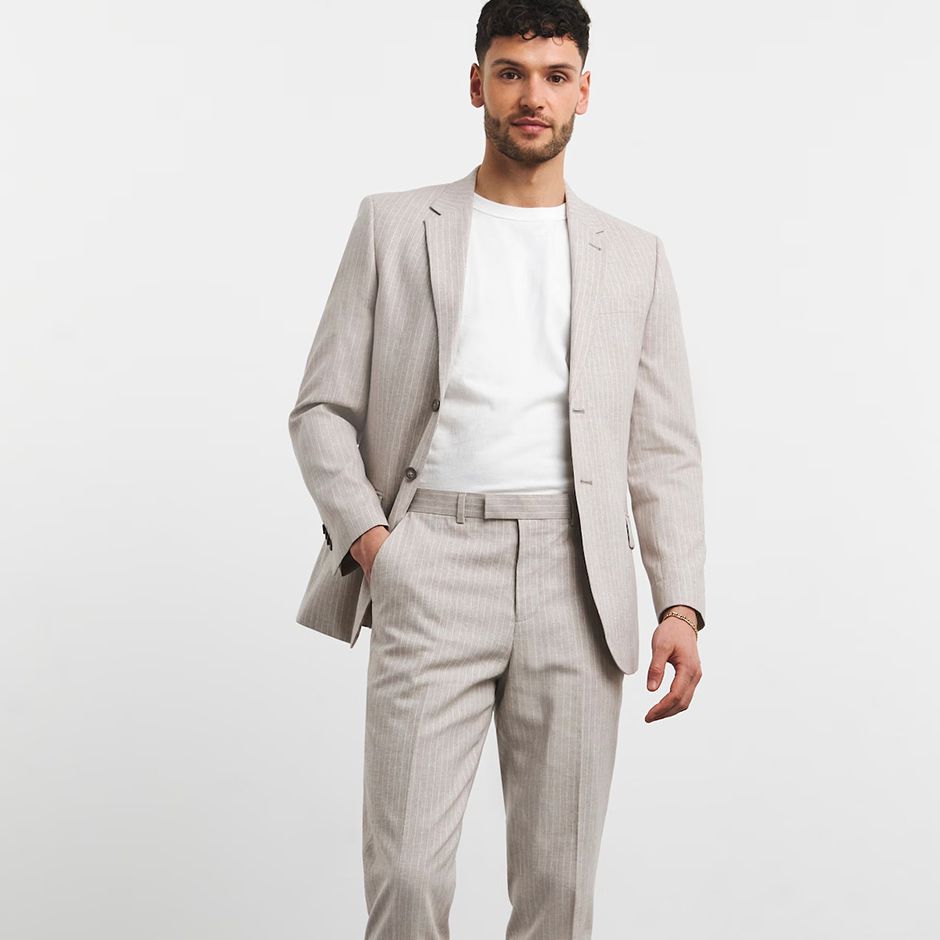 natural-coloured linen blend pinstripe suit for cocktail wedding guest dress codes