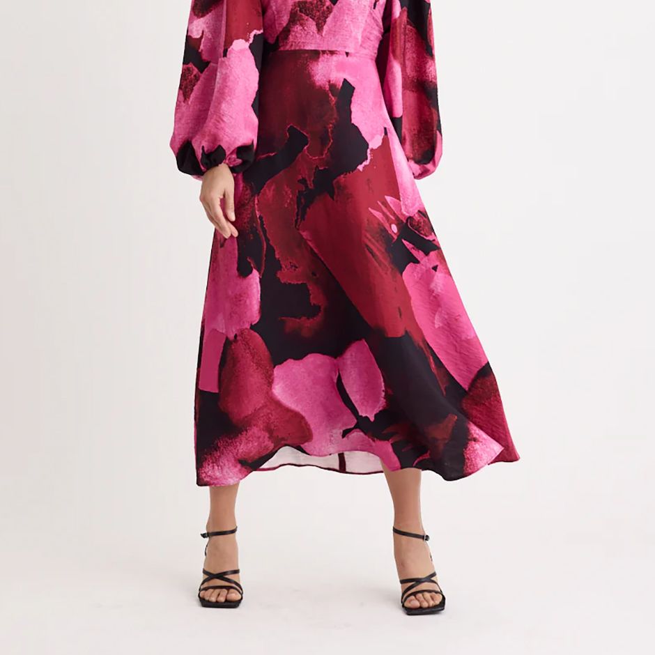 pink floral midi dress with voluminous sheer balloon sleeves and A-line skirt for cocktail wedding guest dress code