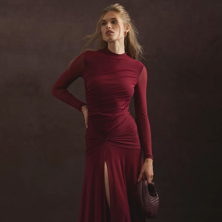 Dark red mesh black tie wedding guest dress with gathered waist and front slit