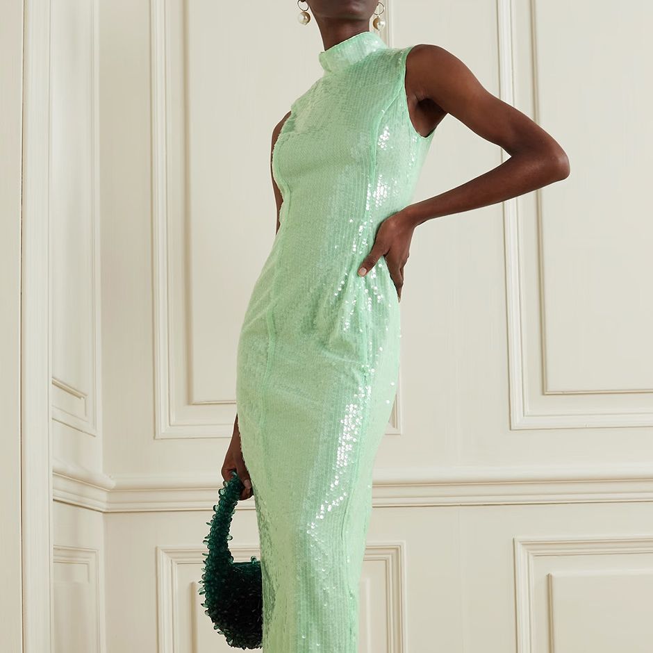 sequin black tie wedding guest dress, made from recycled-tulle in a fresh mint shade with high neck