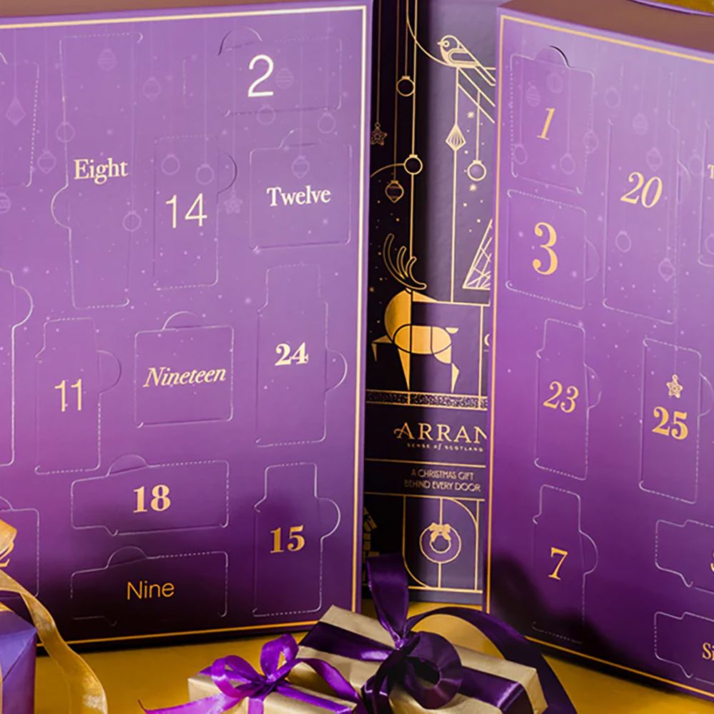 ARRAN Sense of Scotland Advent Calendar 2025 open, surrounded by presents