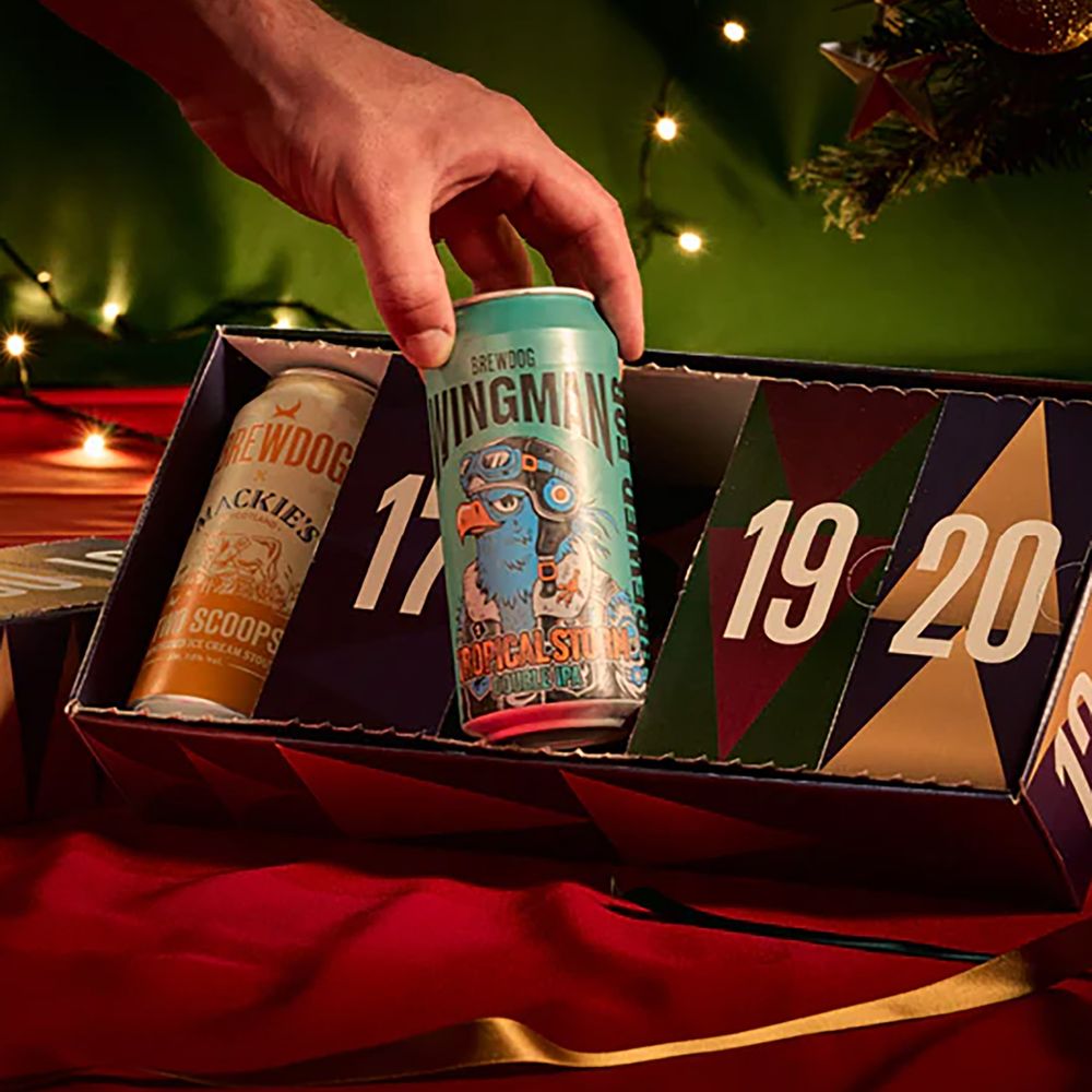 Brewdog Craft Beer Advent Calendar 2025 lifestyle image of man's hand holding a beer